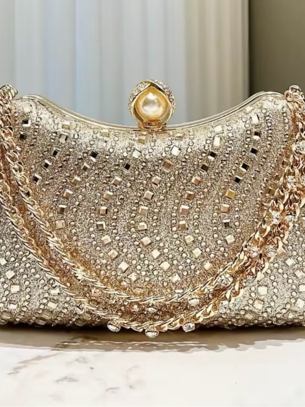 Pearl-Accent Gold Evening Clutch with Crystal Embellishment